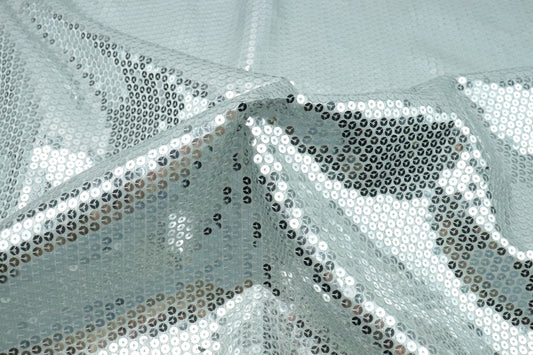 a close up of a white fabric with a design on it