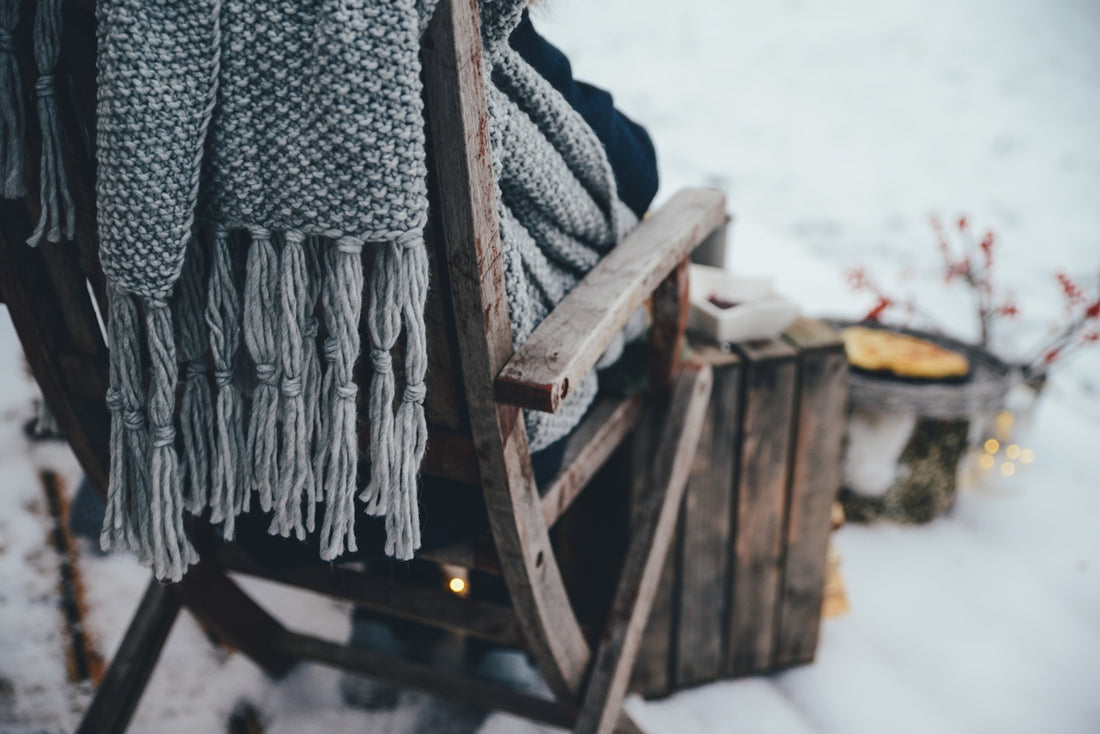 a wooden structure in the snow
