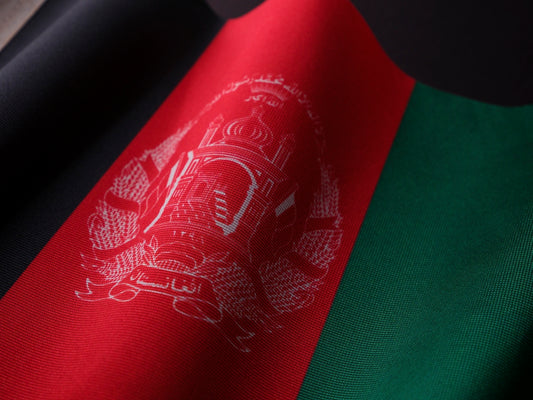 a close up of the flag of afghanistan