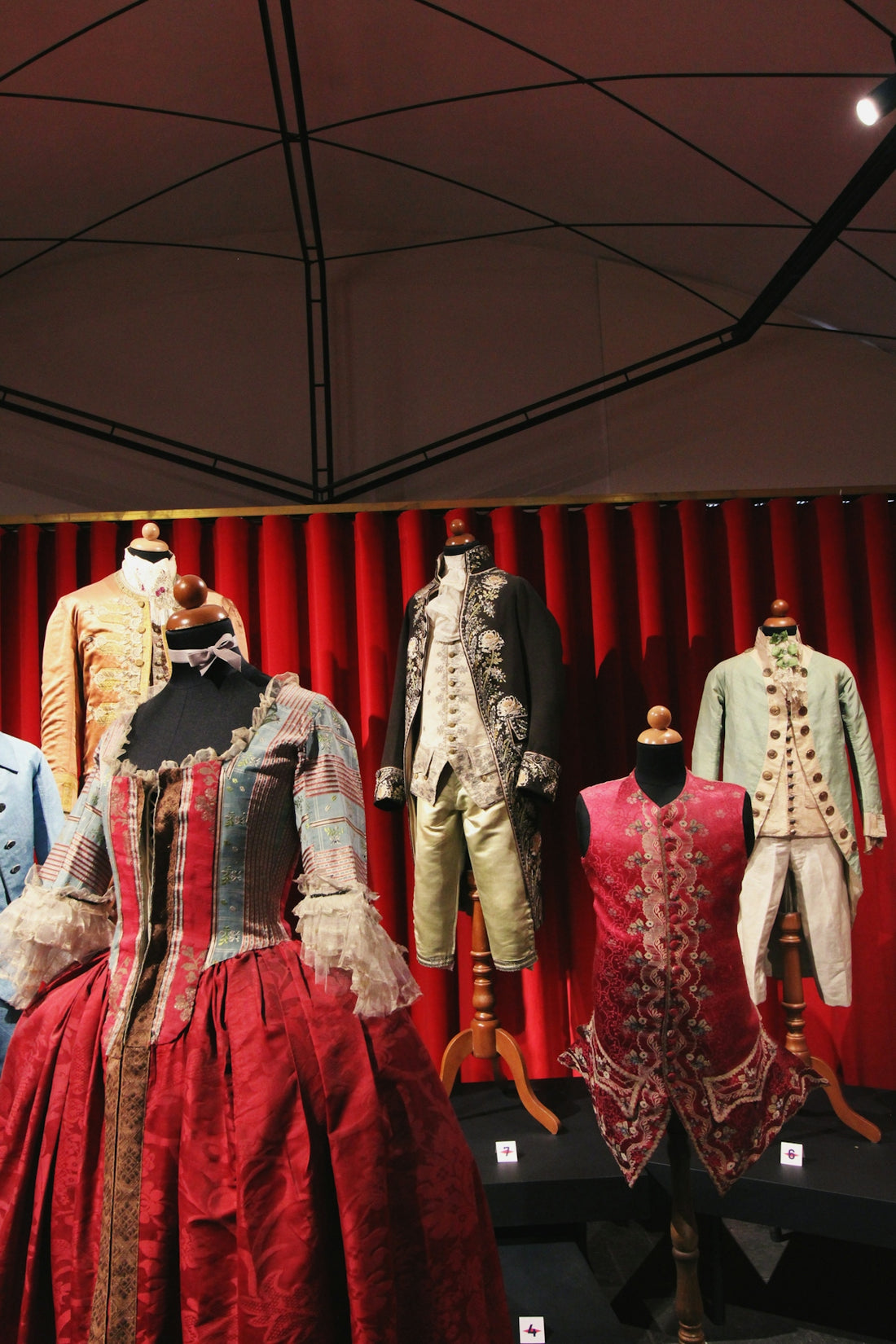 a group of mannequins dressed in historical clothing