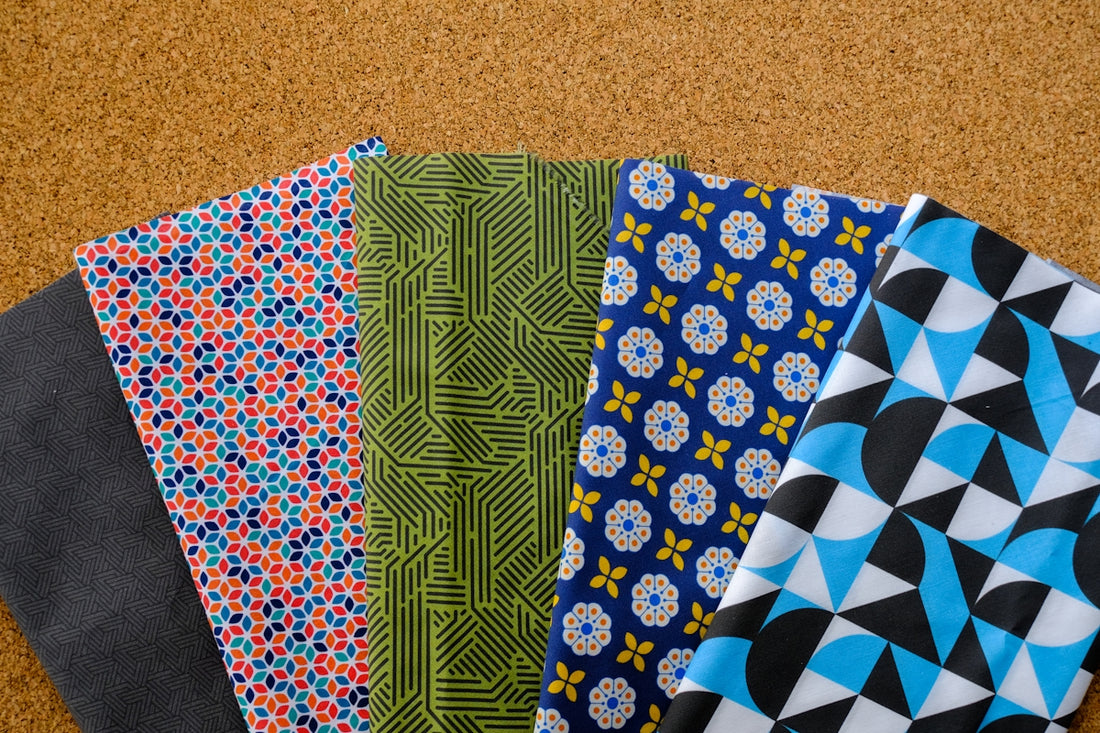 A group of cloths sitting on top of a floor