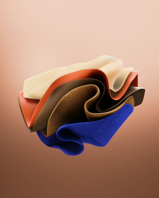 Colorful, layered fabrics form a 3D abstract shape.