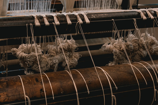 Close-up of wool yarn on a weaving loom